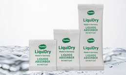 Bustine assorbi-liquidi LiquiDry davanti a un liquido